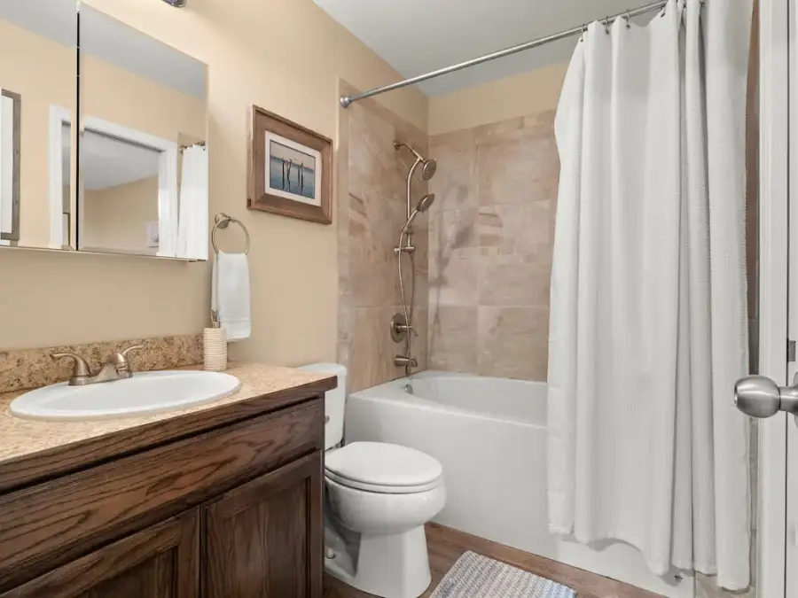 Bathroom 1 is full size with tub/shower combo